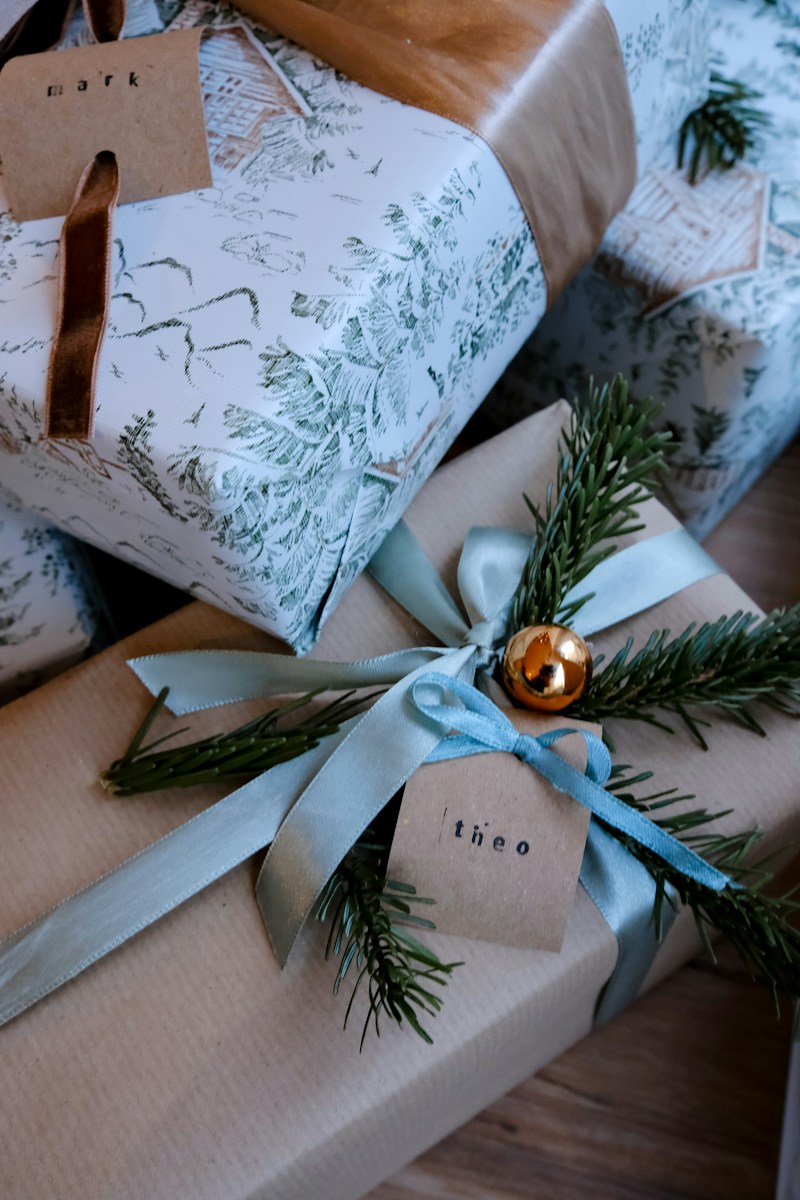 Wrapped presents with blue and brown ribbons